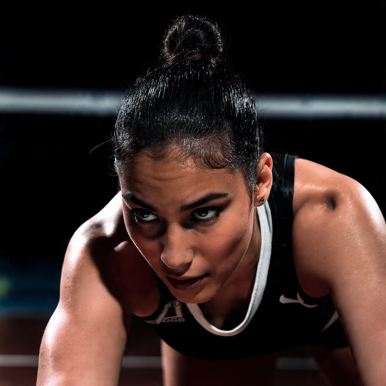 a female athlete on a volleyball court