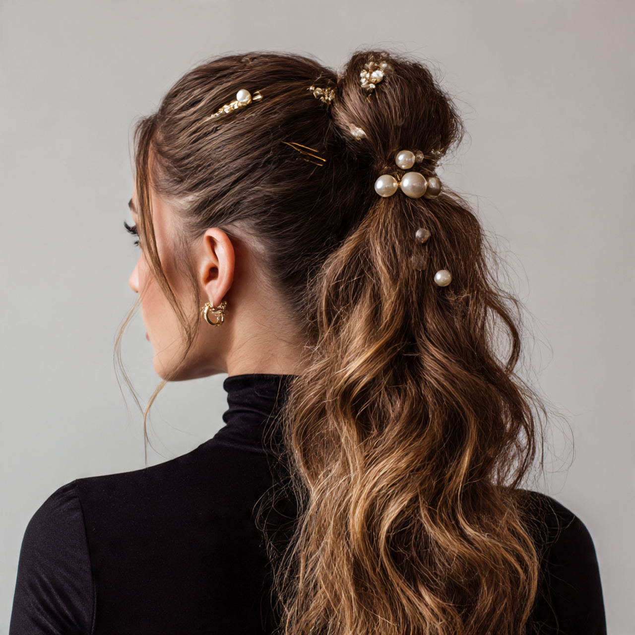 mid height ponytail decorated with hair accessories like