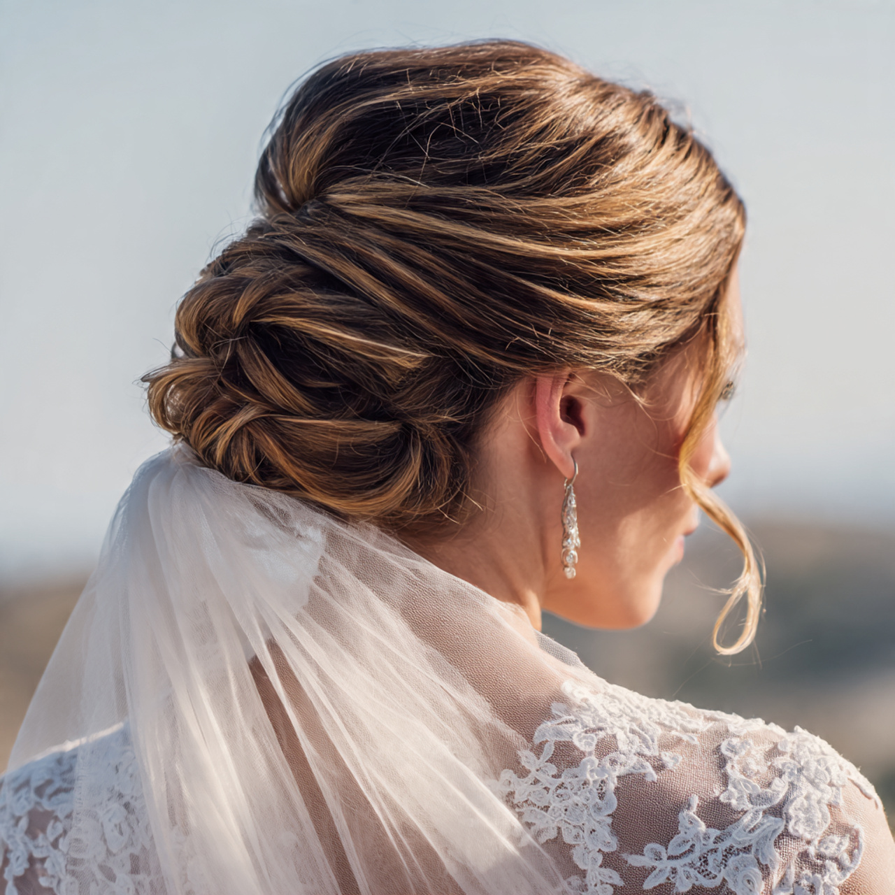 Wedding Hairstyles with Veil: 14 Stunning Bridal Hair Ideas for Every Bride 11 an attractive woman having wedding hair low twiste