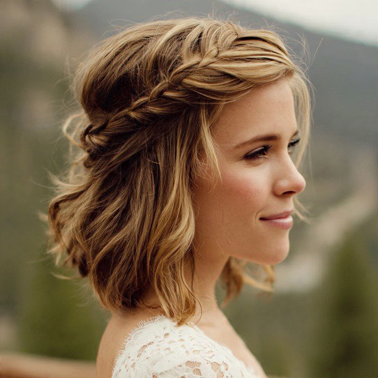 an attractive women with the half up twisted