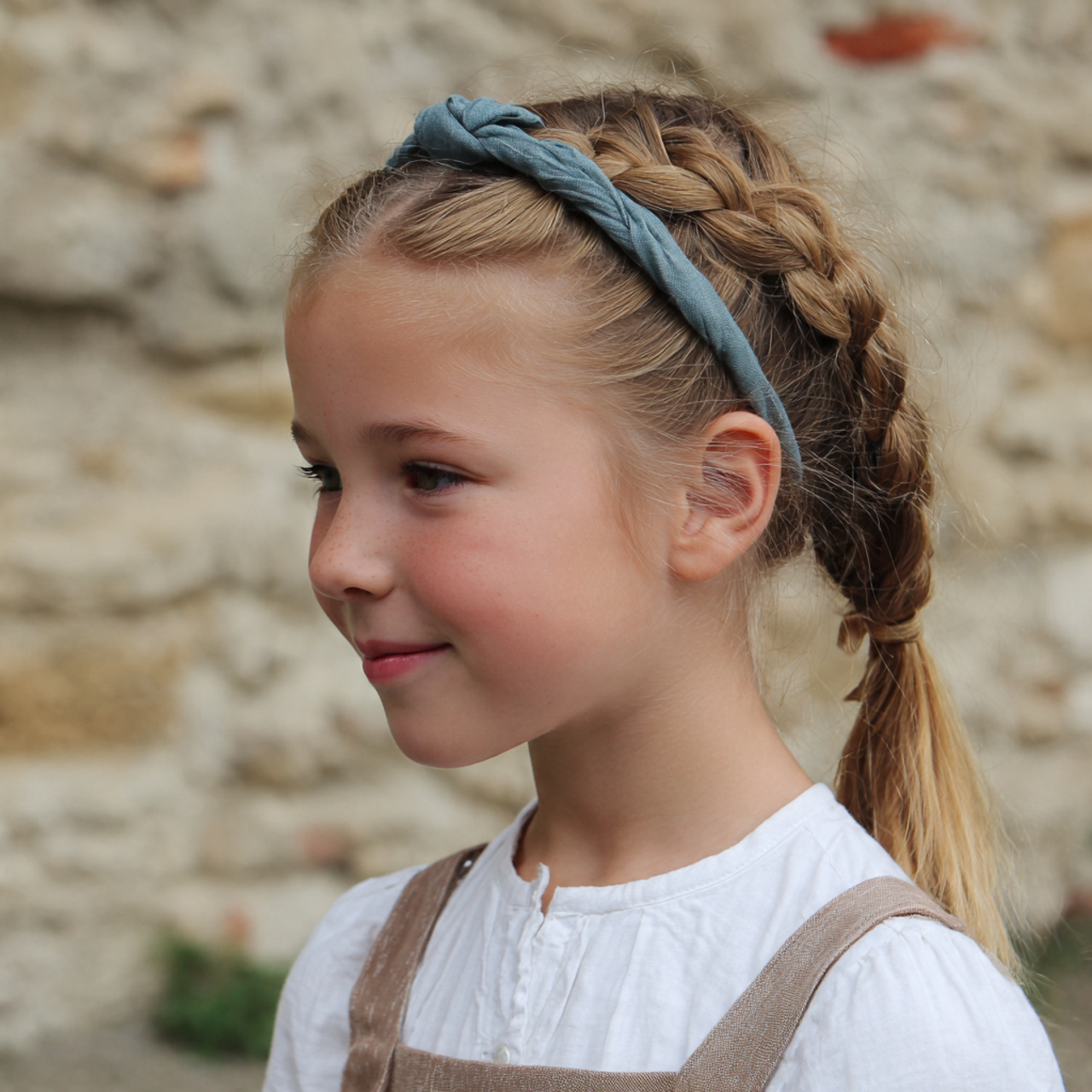 a girl having easy school braided headband style h