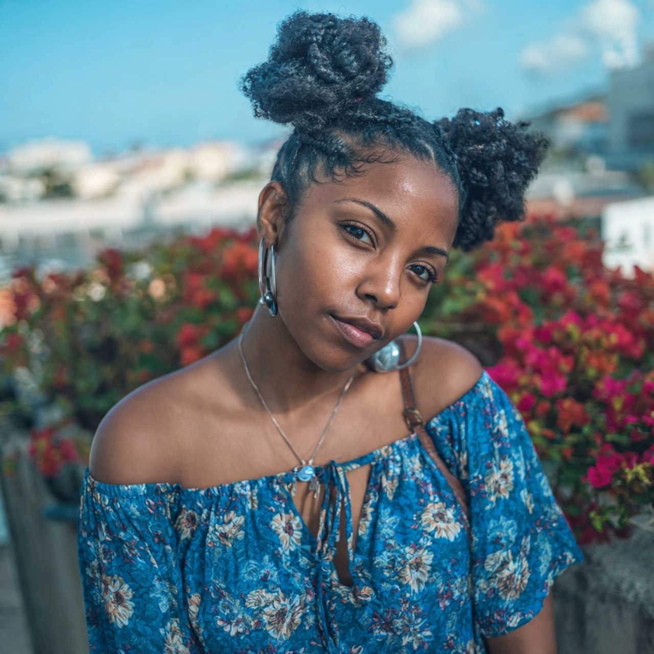 Easy Hairstyles Black Women: Simple Styles for Everyday Beauty 11 an attractive black woman having easy double puff