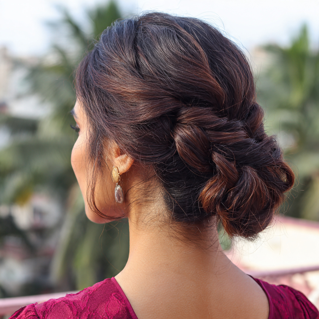 an attractive wedding guest having easy soft braid