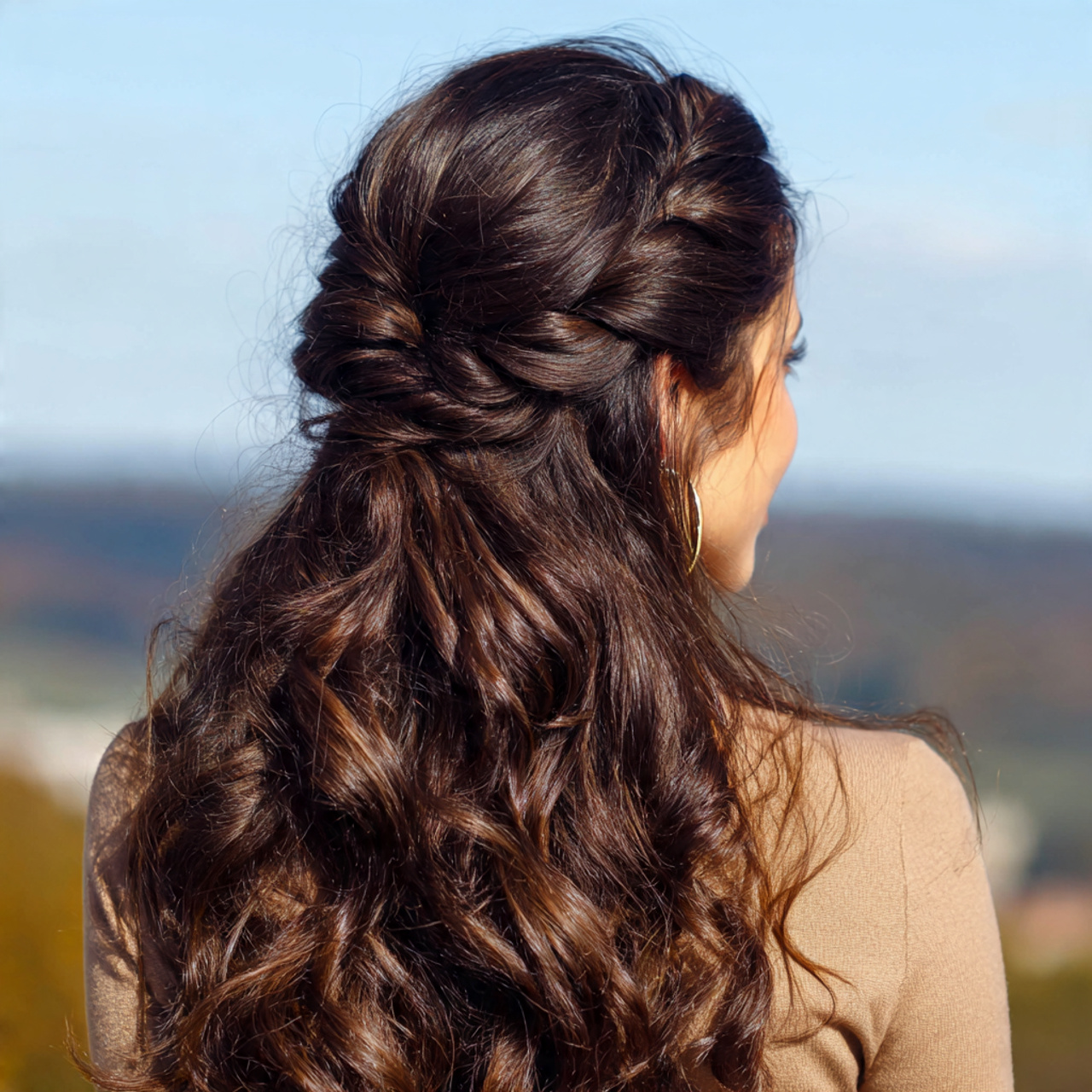 an attractive woman having easy soft half up twist