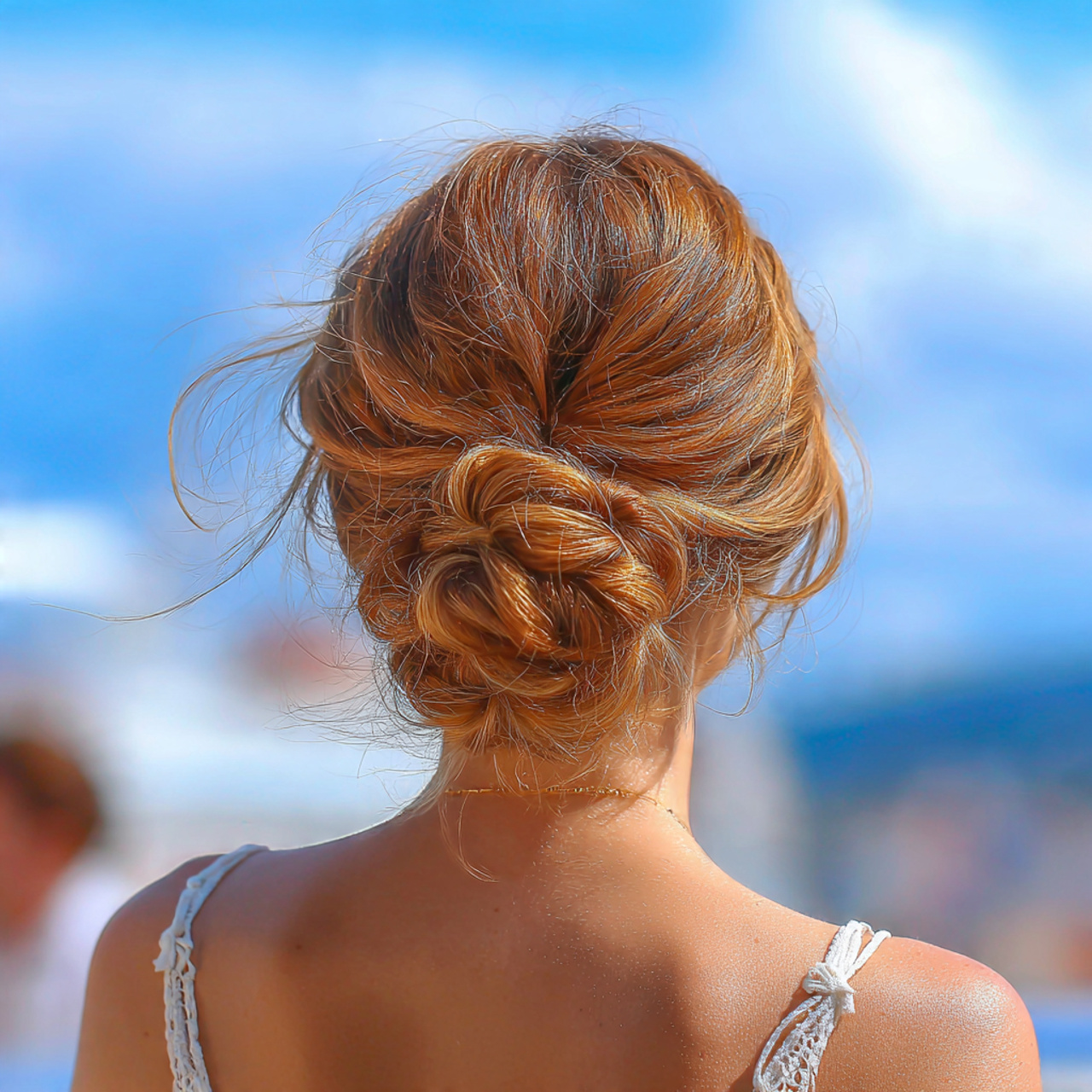an attractive woman having fast easy low bun hairs