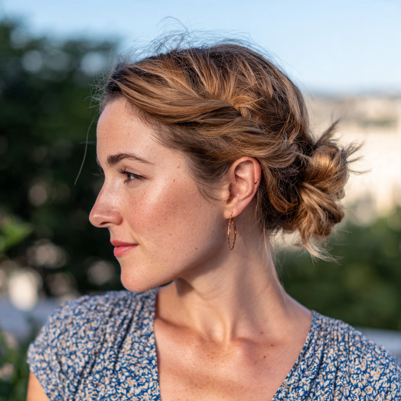 an attractive woman having low twisted knot medium