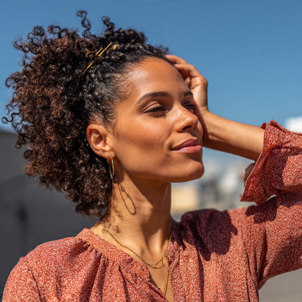 an attractive woman having relaxed claw clip twist