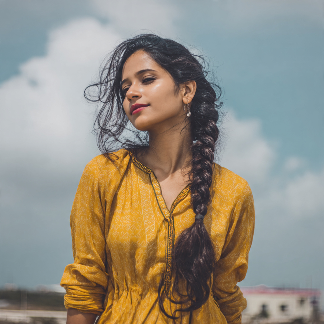 Easy Hairstyles On Kurti That Look Effortless and Beautiful 2 an attractive woman in kurti having easy side brai