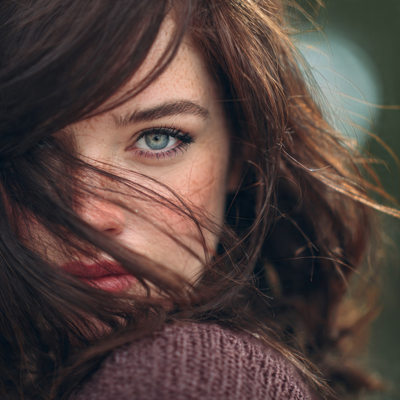 an attractive women having curtain bang hush cut l