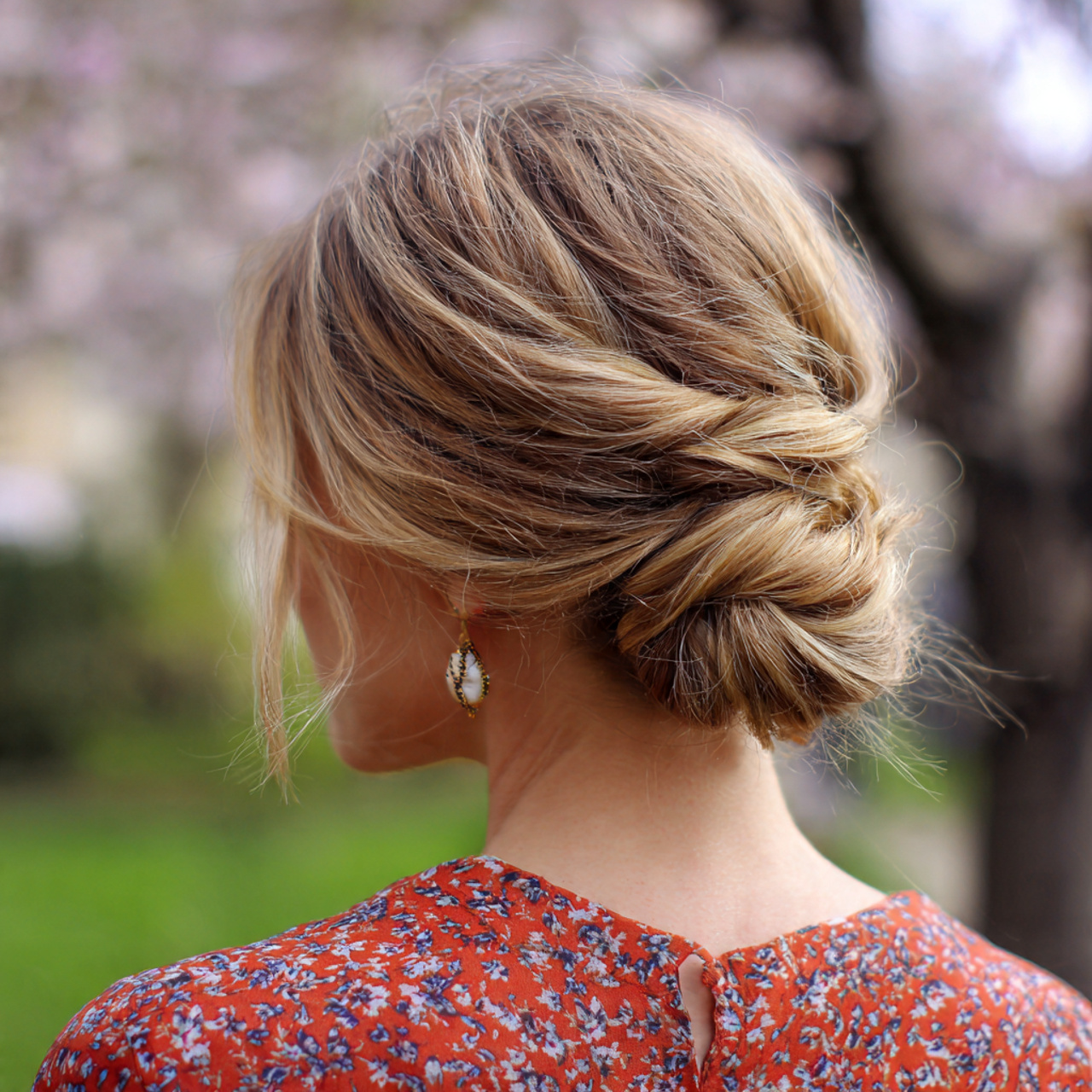 an attractive women having simple easy low twisted