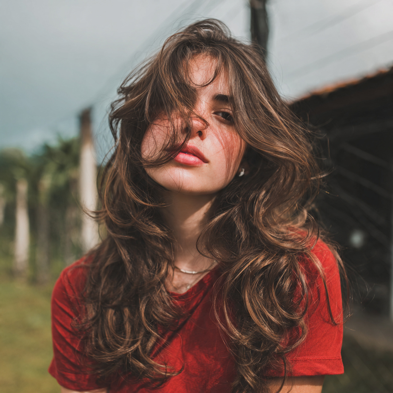 an attractive women having wavy hush cut long hair