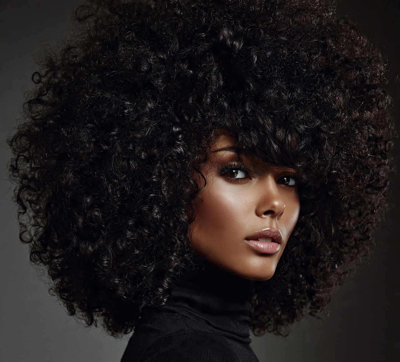 Big Curly Afro With Swooped Bangs
