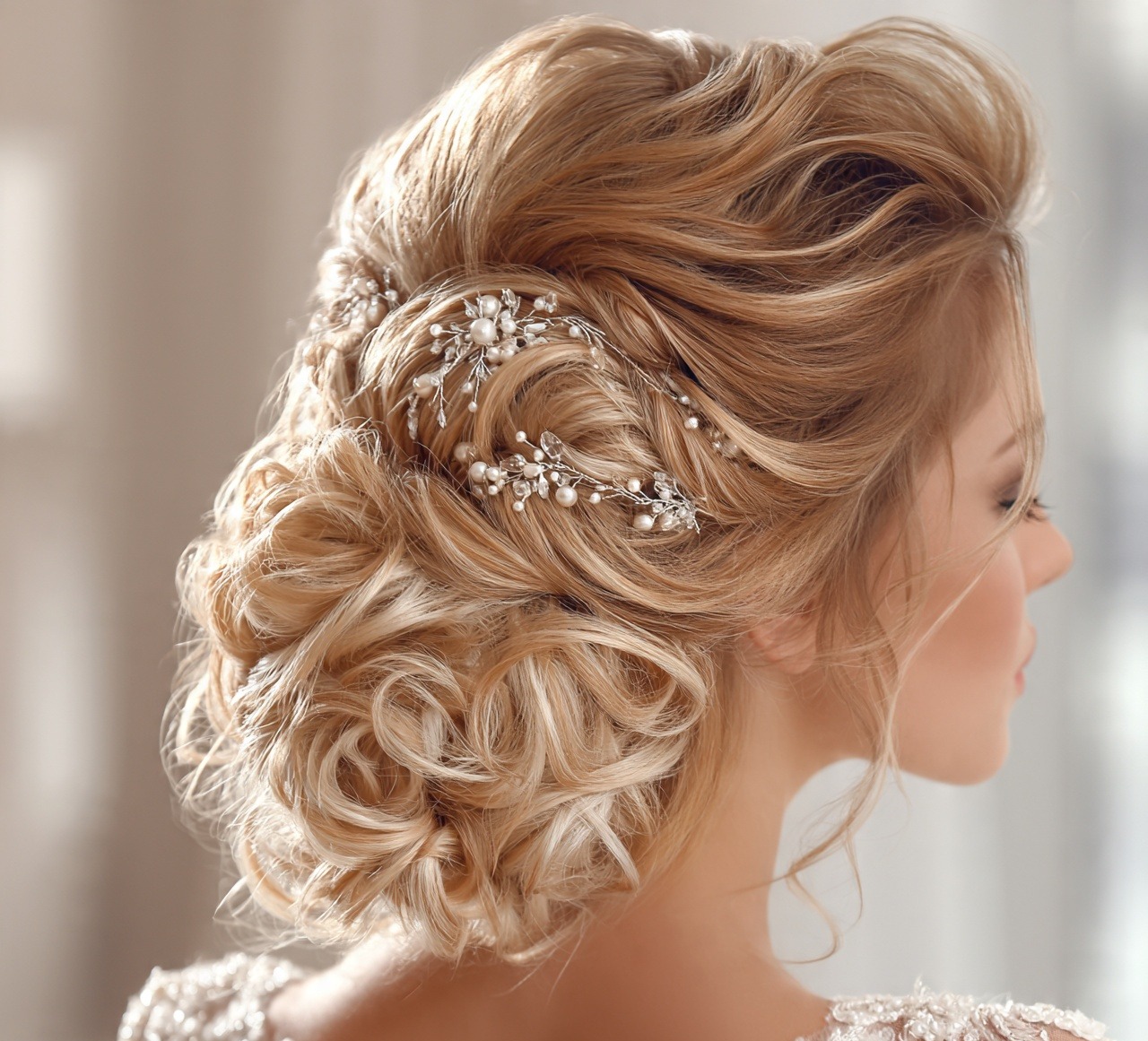 Curly Chignon with Pearl Pins